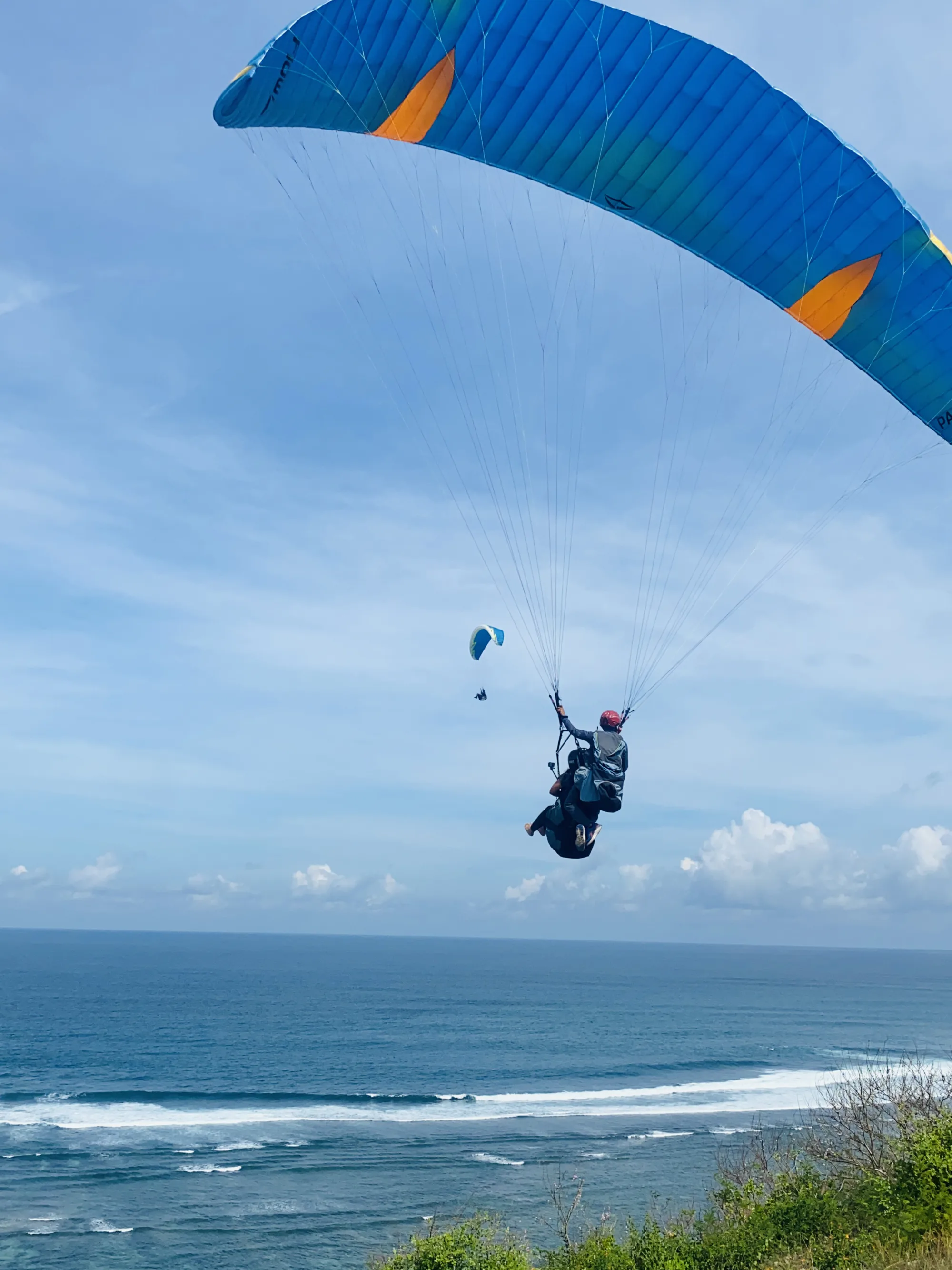 Paragliding above the Bali coast, @yourfitrip